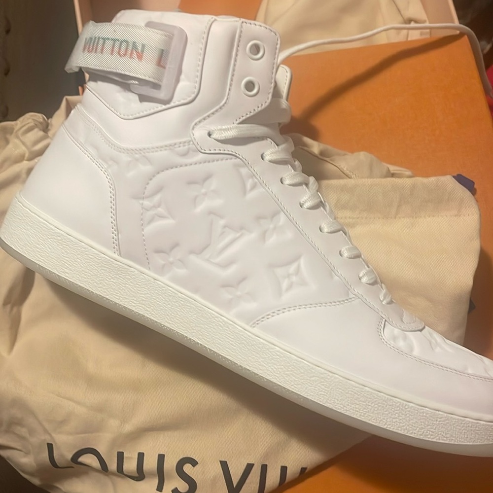 White sz 12 Louis Vuitton shoes.